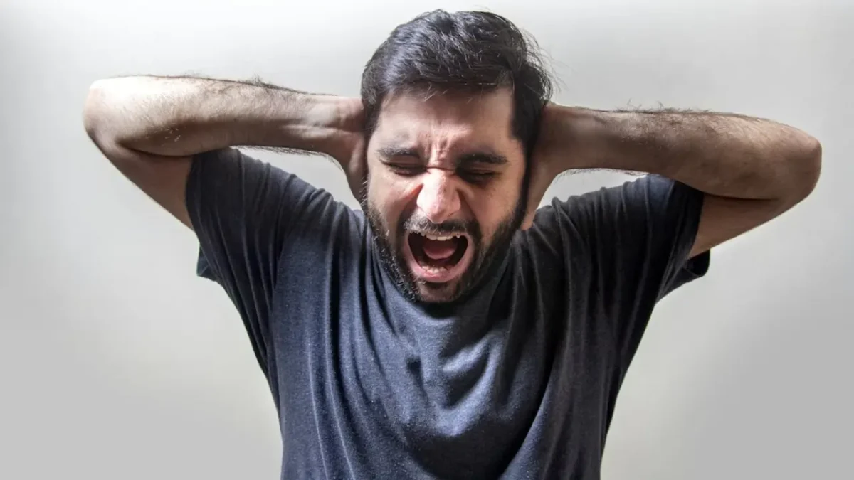 Practicing mindful breathing to calm panic attack