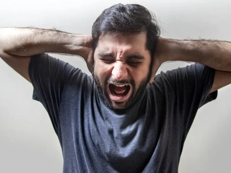 Practicing mindful breathing to calm panic attack